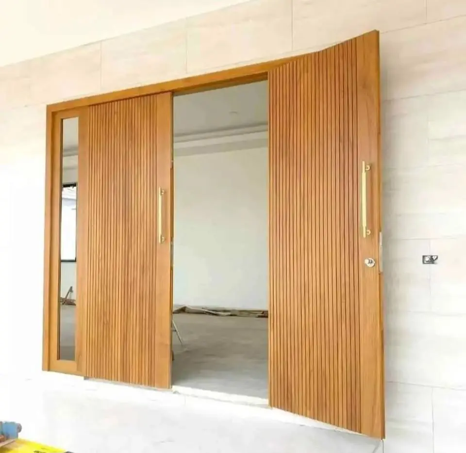 Pintu & Kusen Jati Minimalis: Perpaduan Elegan Ukiran untuk Hunian Anda - Desain Minimalis dan Ukiran Halus pada Pintu dan Kusen Jati