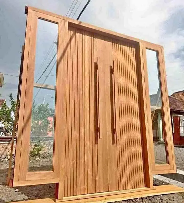 Pintu & Kusen Jati Minimalis: Perpaduan Elegan Ukiran untuk Hunian Anda - Desain Minimalis dan Ukiran Halus pada Pintu dan Kusen Jati